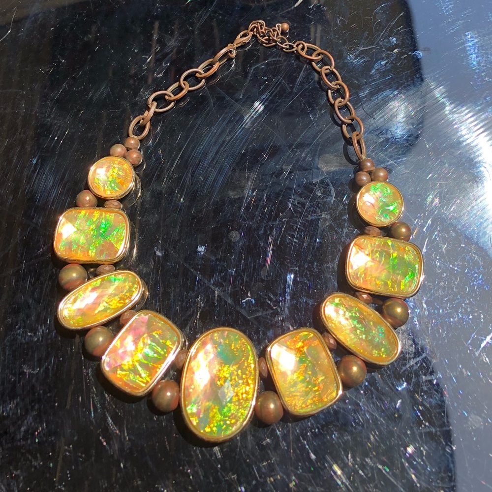 Gold opalescent necklace.